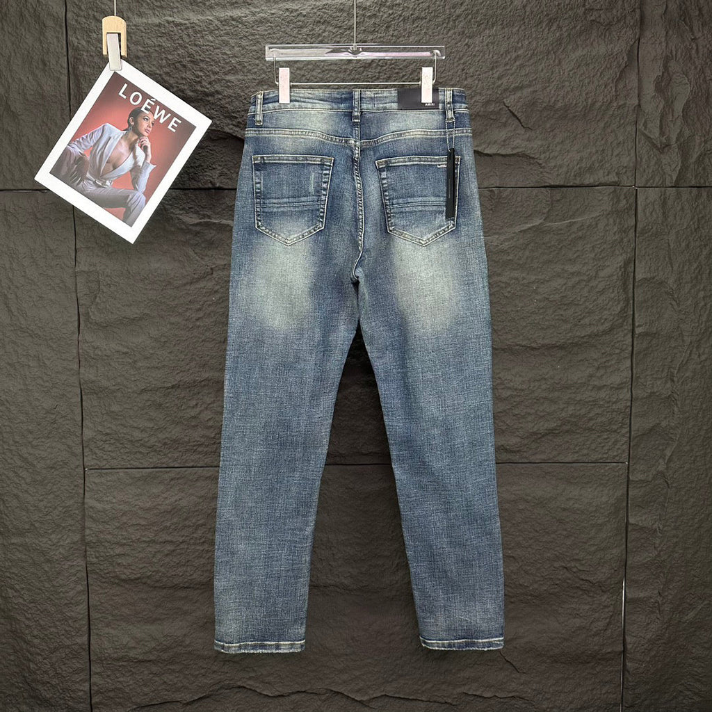 AMIRI Ripped Ribbed Patch Slim‑Fit Denim Jeans